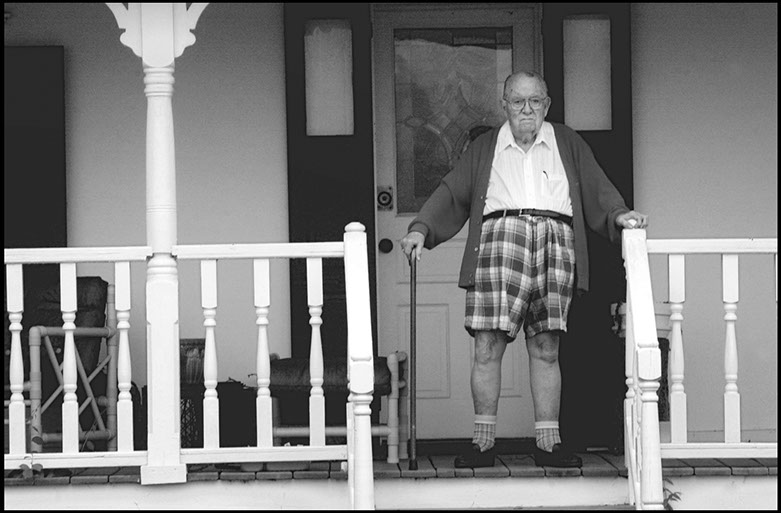 Elderly man on his doorstep, Chester County, Pennsylvania.
